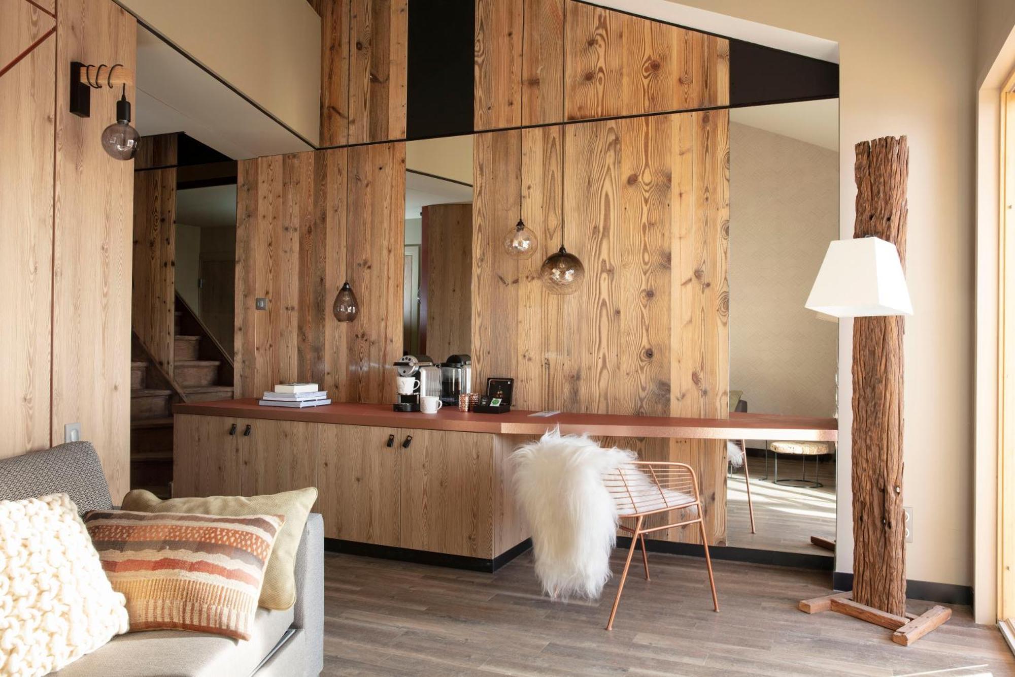 Grandes Rousses Hotel & Spa Alpe d'Huez ภายนอก รูปภาพ Interior of a chalet